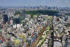 Paul Brown: Aerial view of Shibuya and Yoyogi Park with the Shinjuku Skyline behind, Tokyo, Japan