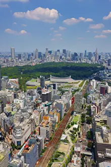 Paul Brown: Aerial view of Shibuya and Yoyogi Park with the Shinjuku Skyline behind, Tokyo, Japan