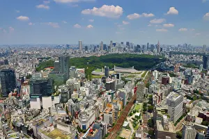 Paul Brown: Aerial view of Shibuya and Yoyogi Park with the Shinjuku Skyline behind, Tokyo, Japan