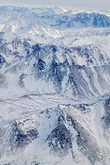 Keren: Aerial view of snow covered mountain range, Alaska, USA
