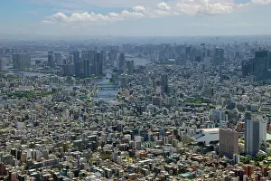 Housing: Aerial view of the Tokyo skyline looking south towards Tokyo Port, Tokyo, Japan