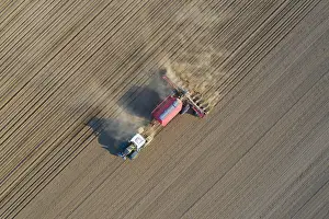 Tractor: Aerial view over tractor with pneumatic seed drill