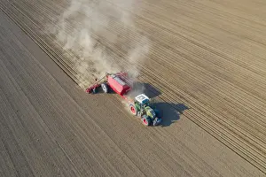 Tractor: Aerial view over tractor with pneumatic seed drill