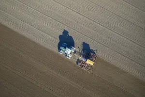 Tractor: Aerial view over tractor with pneumatic seed drill