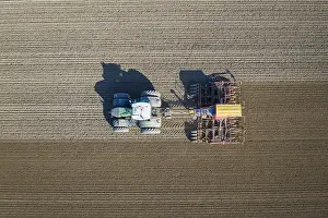 Tractor: Aerial view over tractor with pneumatic seed drill