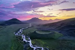 Twist: Aerial view, volcanic crater, interlaced river