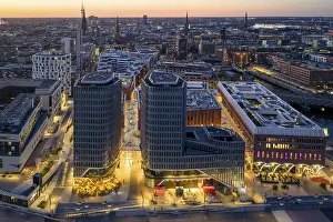 Aerials: Aerial view of Westfield Hamburg Uberseequartier zur Blauen Stunden