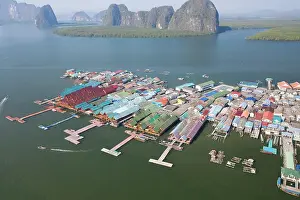 Phang: Aerial view, wooden house settlement, pile dwelling
