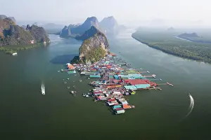 Phang: Aerial view, wooden house settlement, pile dwelling