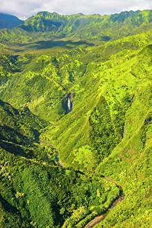 Hawaiian: Aerial of a waterfall in the interior of Kauai