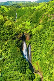 Hawaiian: Aerial of a waterfall in the interior of Kauai