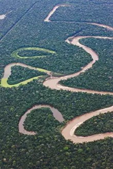 Lowlands: Aerial of winding river and rain forest