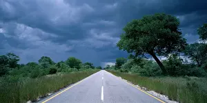 Roadway: Africa, Botswana, Rainy season storm over