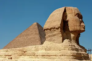 Ruin: Africa, Egypt, Giza. Classic view of the Sphinx and one of
