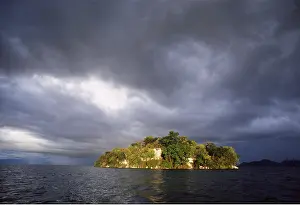 Elizabeth Bomford: Africa - Storm clouds over islet