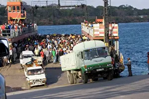 Mombasa: Africa - Vehicles and passengers disembarking from