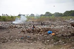 Sorting: Africans sorting through waste on roadside rubbish tip