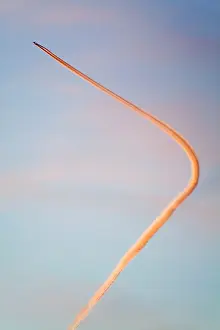 Aeroplane: Aircraft contrail / vapour trail - at sunset