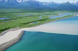 Joining: Alaska USA - showing river joining sea