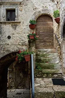 Stairway: Alley with archway, staircase, mountain village