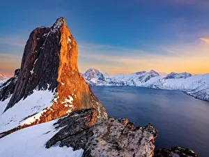 Segla: Alpenglow on the steep mountain Segla, fjord Mefjorden