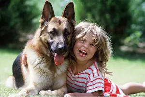 Laughing: ALSATIAN / GERMAN SHEPHERD DOG - with girl