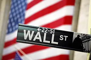 Signs: American flag on the New York Stock Exchange and the Wal