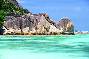 Destinations: Anse Reunion beach, granite rocks, La Digue Island