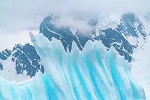 Iceberg: Antarctica, Cuverville Island. Close-up of iceberg. ic Cathy
