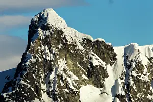 Ronge: Antarctica, Setting sun lights mountain