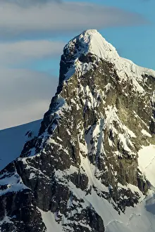 Ronge: Antarctica, Setting sun lights mountain