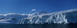 Austral: Antarctica, Summer sun lights mountain peaks