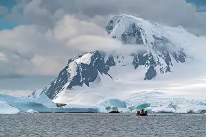 Zodiac: Antarctica, Yalour Islands. Tourists in Zodiacs viewing