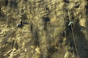 Workers: Anti-Erosion Netting