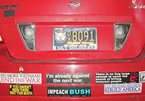 Anti: Anti-war slogans - on rear of a car as it was seen