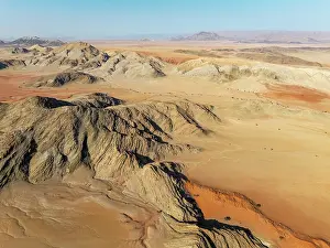 Eroded: Arid plains, sand dunes and bare mountain ridges in the Tsondab Valley in the Namib Desert