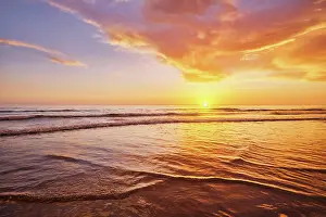 Waves: Atlantic ocean sunset with surging waves at Fonte
