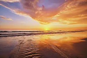 Waves: Atlantic ocean sunset with surging waves at Fonte