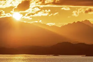 251020: Atmospheric sunset over a high mountain range, in