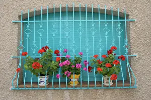 Attractive: Attractive window display with blue railings and