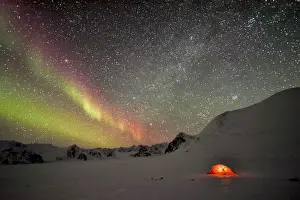 Tent: Aurora borealis on a bivouac on the Kolding Fjord