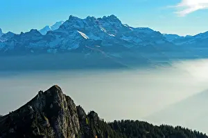 Rhone: Autumn fog in the Rhone valley, summit of the Dents