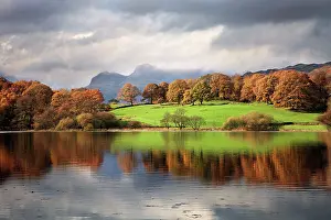 Langdale: Autumn reflections in Loughrigg Tarn with the Langdale