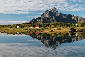 Austvgy: Autumnal landscape, water reflection with mountain