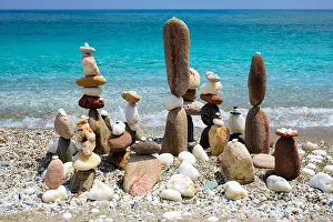 Silence: balance and harmony concept, stacked stones on beach, coast