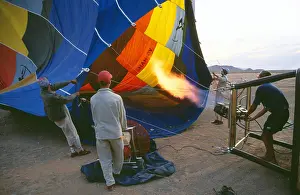 Taking: Balloon Safari - in the early morning in order to