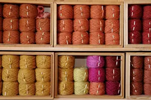 Shelf: Balls of Sheep wool dyed by craftsmen Orbey