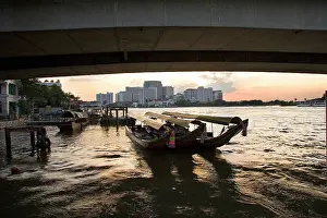 Dock: Bangkok, Thailand. A sunset over a Bangkok