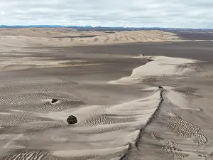 Remote: Barchan dunes and sand patterns at the edge of the Namib Desert