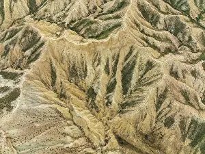 Isolation: Bare ridges of eroded sandstone in the badlands